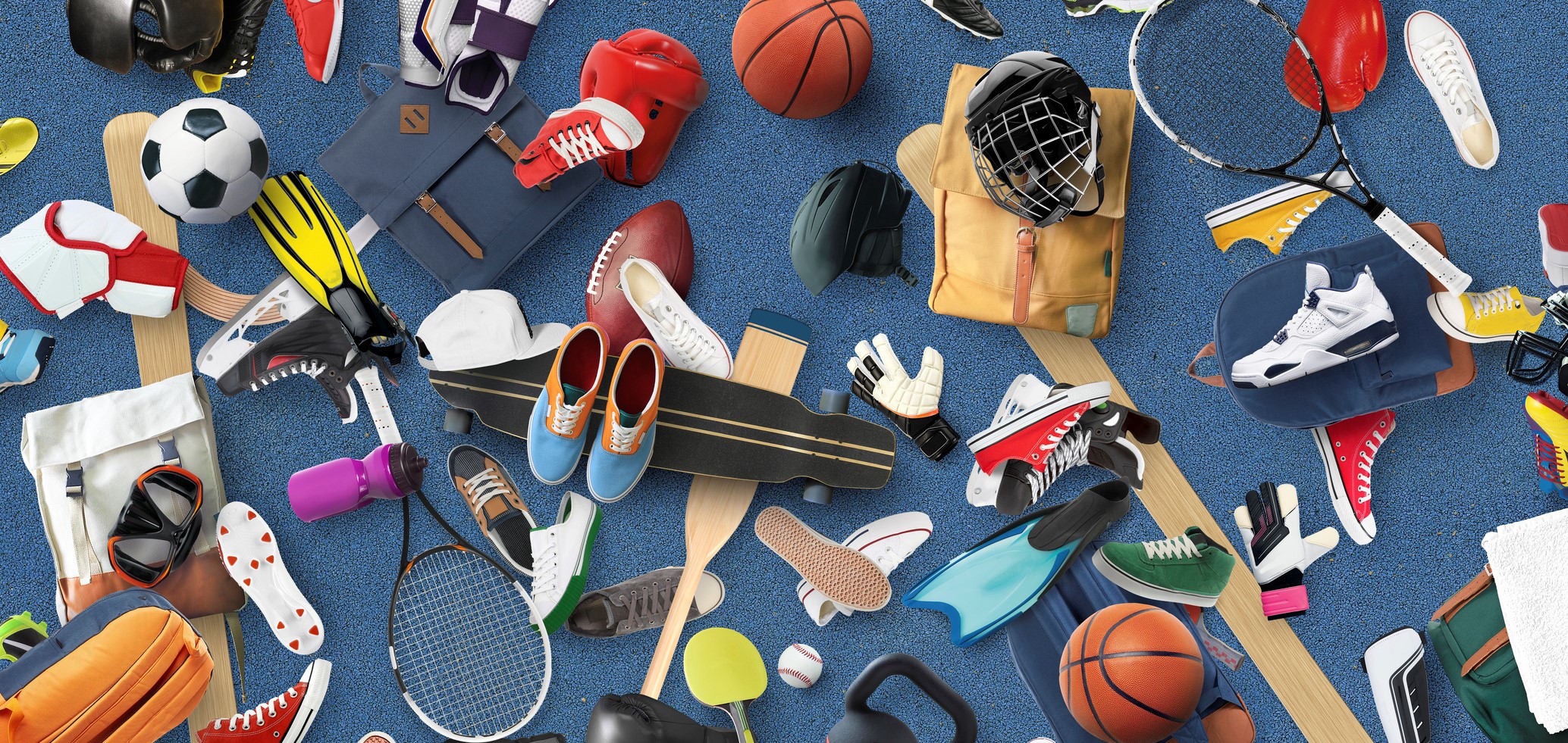 Sports equipment and clothing are scattered in the gym